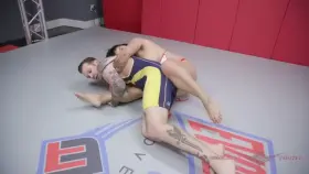 Wrestling match with Asian Mia dominating a guy at Evolved Fights