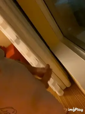 Hubby jacking his cock until he cums in the hotel window ... lights on traffic driving passed below