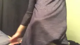 Meghan Mendez pulling up her dress