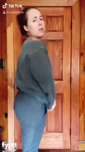 Redhead MILF gets naked on NSFW TikTok with Buss It challenge