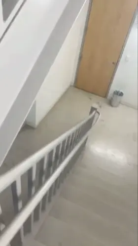 Quick wank on the stairs at work.
