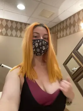 Flashing her pierced tits