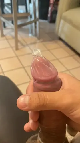 First time trying on a condom. I used it to catch my precum. [M]