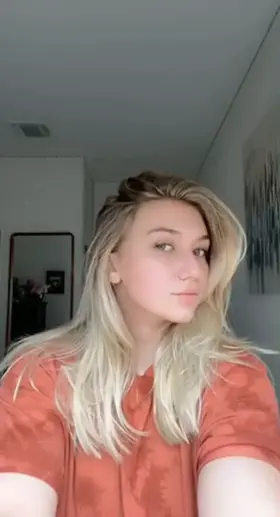 Lift my top to tease my neighbors