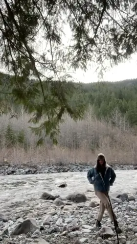 on the side of the highway in the mountains somewhere