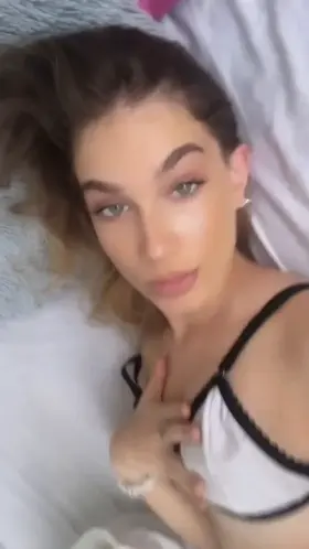 I am on bed playing and horny