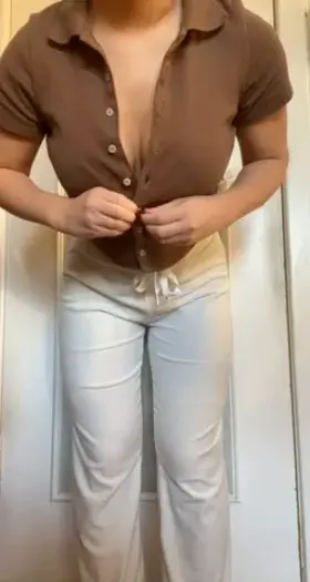 Taking off my top slowly for a good drop