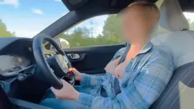 Challenged to drive down the motorway with boobs out
