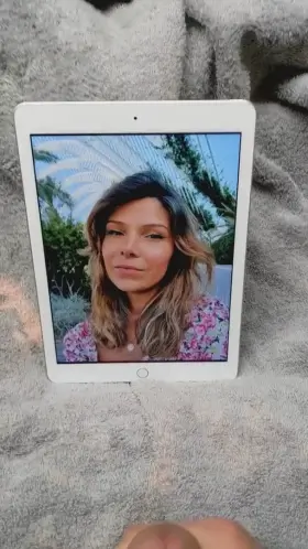 Splashing her cute sexy face with a big load