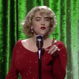 Billie Eilish in a red dress.