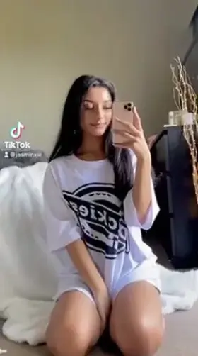 She has a knowing smile