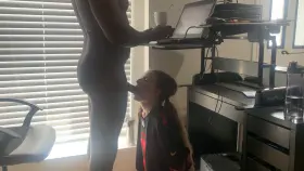 White slut sucking cock in a Kap jersey while her Dom makes money