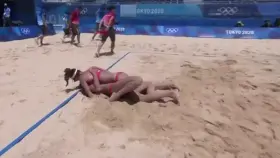 Sweet celebration on beach volleyball court
