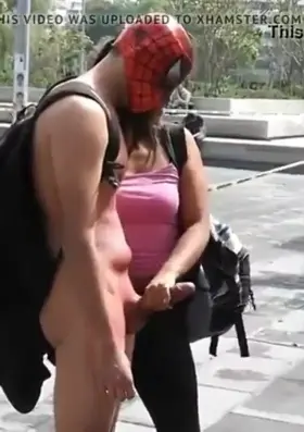 She Gives Him A Public Handjob