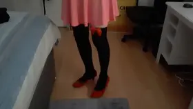 Pink skirt, bow thigh highs and heels. We have a winner! 😘