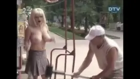 Surprise by showing her tits and scares everyone