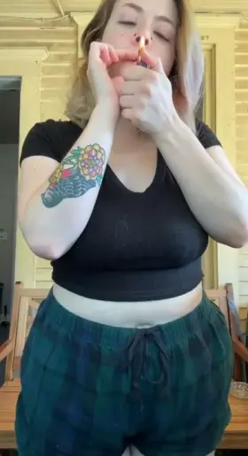 lighting up is so much more (f)un with my tits out 🥺