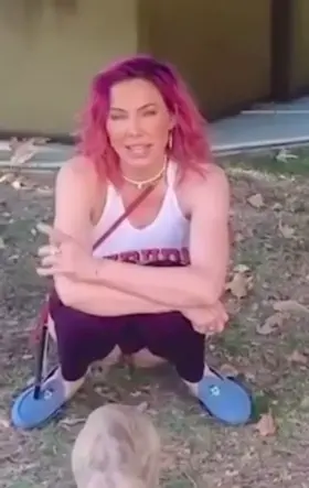 Whitney Cummings taking a piss on the grass on Instagram