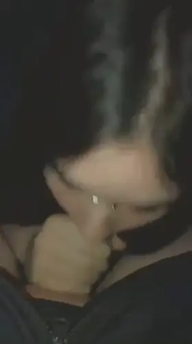 Girl with nose piercing sucks and strokes cock