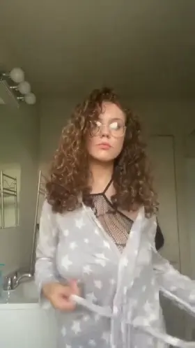 Amazing teen stripping to show her lingerie