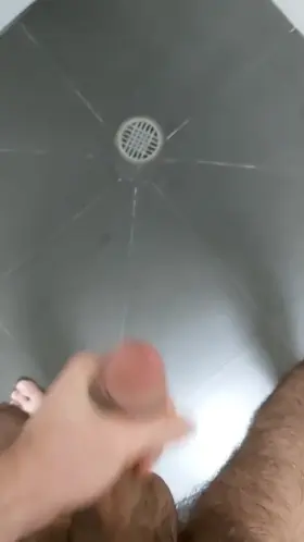 A huge blast of cum in the shower!