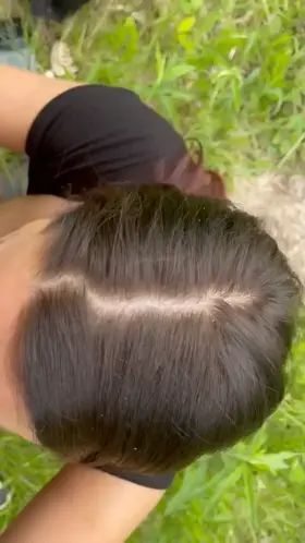 Sucking someone’s cock in the park while on the phone with hubby