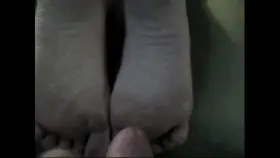 Big load on her cute soles.