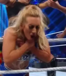 Looks like Carmella is used to bobbing her head like this