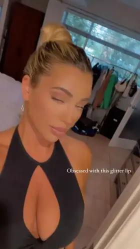 Busty in a black dress