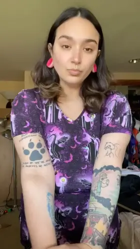 Maleficent scrub top + Heavy titty drop.