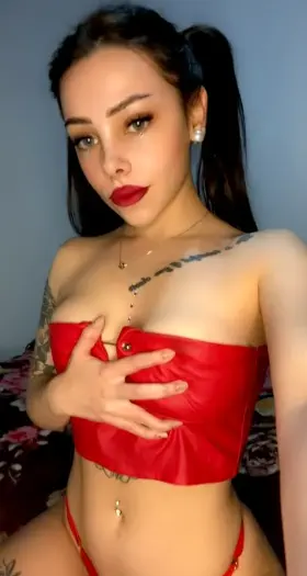 Tocuhing my boobs. Do you like my red outfit
