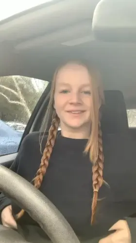 Just a little titty flash in the parking lot before class!