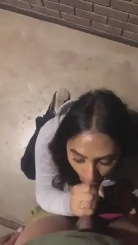 Indian girl gives a nice blowjob in staircase