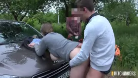 Creepy guy watching a couple having sex outdoors