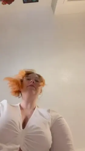 I’m on top smothering you with my tits and belly