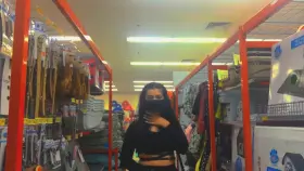 Tits out with a worker in the next aisle