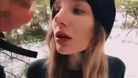 Sexy babe receives a fine facial outdoors