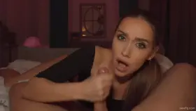 At a pov shoot sexy brunette is giving a sensual handjob