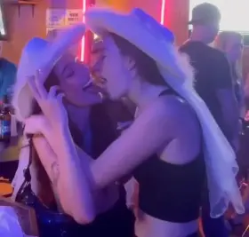 Touching tongues at the bar