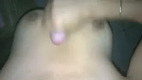 Spraying wifes tits with cum