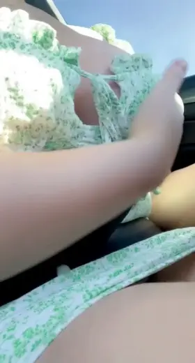Flashing my big tits while driving....😏