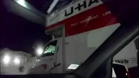 Squished againt the car window.