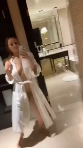 Some girl dancing in bathrobe and kinda slips pussy on ig story - [IG] emmeleigh