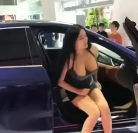 Vietnamese Model Nipple Tease at Vietnam Car Show - GIF