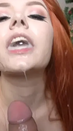 Beautiful redhead playing with cum