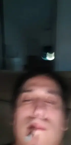 Slut sucks my cock while I smoke a joint