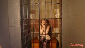 In her cage.