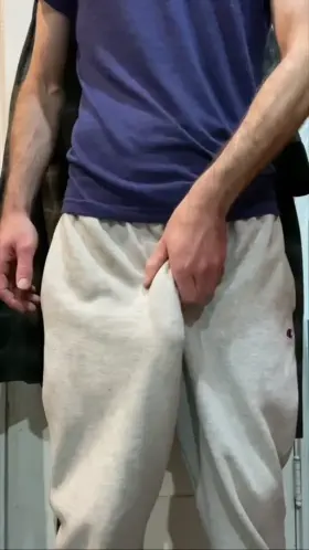 Revealing my big dick in grey sweats