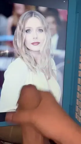 Elizabeth Olsen looks hot with my load