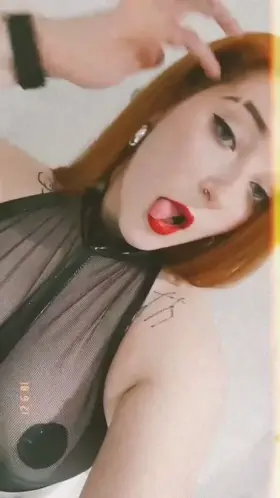 Red lips and black latex, do you like it?